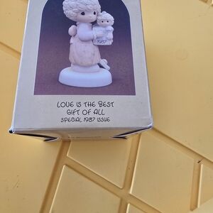 Precious Moments Cream and White Angel with Child Figurine
